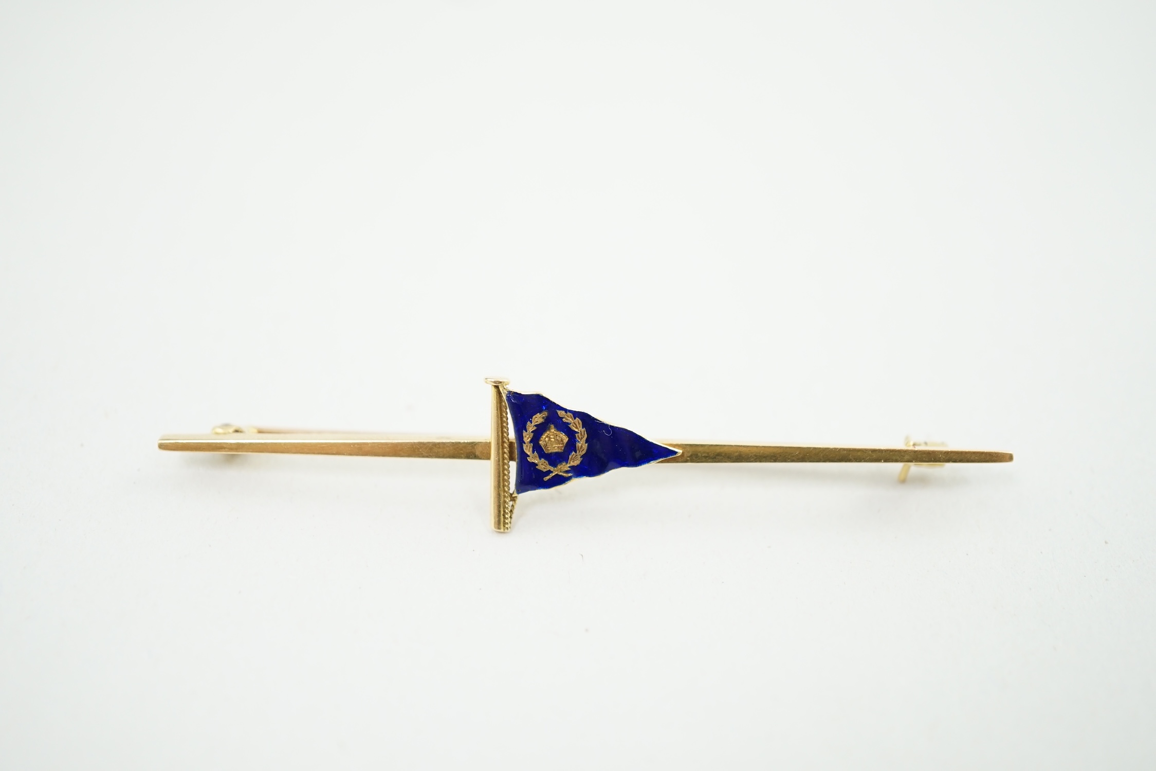 An early 20th century Benzies of Cowes 18ct gold and enamel ensign bar brooch